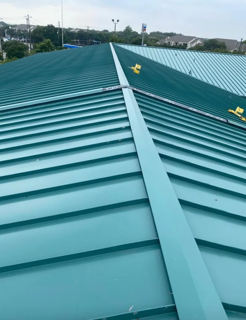 Green commercial metal roof ridge and valley for Metal Roof Repair in Los Fresnos
