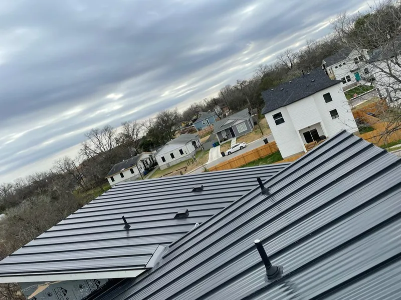 Standing seam metal roof panels with vents for Skylight Repair in Los Fresnos